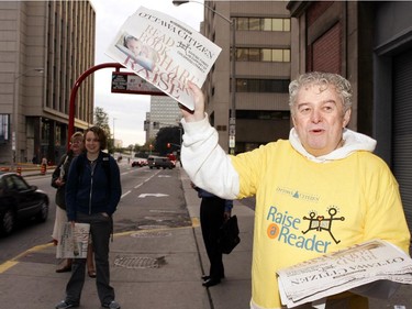 Max Keeping, Vice-President of News and Public affairs, CJOH-TV,  hawks the Ottawa Citizen, in downtown Ottawa, during the annual Raise-a-Reader campaign where volenteers hawk the Ottawa Citizen and collect donations for the Raise-a-reader program.