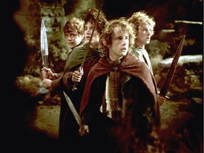 OTTAWA 12/05/01   Hobbits (L-R) Sam (Sean Astin), Frodo (Elijah Wood), Pippin (Billy Boyd), and Merry (Dominic Monaghan) are surrounded in New Line Cinema's epic adventure, THE LORD OF THE RINGS: THE FELLOWSHIP OF THE RING. Photo credit: Pierre Vinet / New Line Cinema.