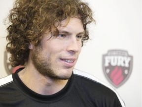 Ottawa Fury's Tom Heinemann talks to the media during the first day of training camp.