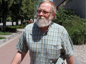 OTTAWA, ON: JULY 22, 2013 -- After being released on bail, Franz Klingender leaves the Elgin St. courthouse in Ottawa on Monday, July 22, 2013. Klingender, age 58, curator of the Canada Agriculture Museum, was charged with nine counts of possession of child pornography and seven counts of distributing the material. (photo by Mike Carroccetto / Ottawa Citizen)¤¤ (for CITY / WEB story FEDIO)