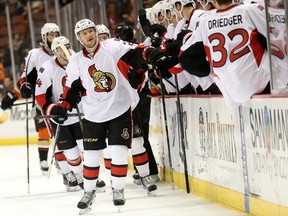 ANAHEIM, CA - FEBRUARY 25:  Erik Condra #22 of the Ottawa Senators celebrates with teammates as he skates by the bench after scoring a goal in the first period against the Anaheim Ducks at Honda Center on February 25, 2015 in Anaheim, California.