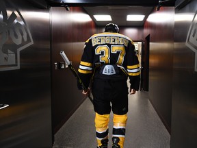 Patrice Bergeron is out of the Bruins' lineup after fracturing a foot while blocking a shot in a recent game. Steve Babineau/NHLI via Getty Images