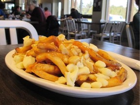Poutine, using fresh cheese curds, is the most popular item on the menu of the self-serve restaurant located in the newly re-opened St. Albert Cheese Co-operative.