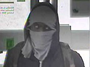 The Ottawa Police Service Robbery Unit is seeking the public's
assistance in identifying a bank robbery suspect.

On Sunday February 8, 2015, at approximately 3:30 pm, a lone male suspect
entered a bank situated along the 2300 block of St. Joseph Boulevard in
Orleans. The suspect produced at note to a customer service
representative demanding cash. The suspect indicated he had a gun but
none was seen. The suspect fled the premises empty-handed after the
suspect learned the victim did not have ready access to cash. There were
no injuries.

On February 9, 2015, at approximately 5:50 pm, a lone male suspect
entered a bank situated along the 2600 block of Innes Road in Blackburn
Hamlet. The suspect produced a note demanding cash and indicating he had
a gun. The suspect was provided with a quantity of cash and then pulled
out a handgun and demanded more. The suspect left the bank with an
undisclosed quantity of cash. There were no injuries. The suspect was
last seen running eastbound along Innes Rd.

On January 23, 2015, the same branch Innes Road branch reported a male
that attended at 7:40 pm.  The suspect sought for a note and left the
bank when he couldn't readily locate it. No demand or similar was made.
There were no injuries and no loss.

The suspect being sought is described as a black male, 19-23 years of
age, slim build, 5'6'-5'8" (168 cm-173 cm) in height, likely
right-handed. Various clothing has been worn