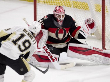 Pittsburgh Penguins right wing Beau Bennett shoots on Ottawa Senators goalie Robin Lehner during first period NHL action Thursday February 12, 2015 in Ottawa.