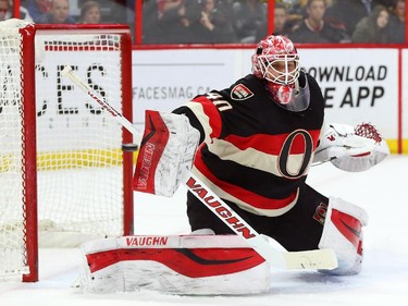 Robin Lehner of the Ottawa Senators makes the save against the Pittsburgh Penguins during second period of NHL action at Canadian Tire Centre in Ottawa, February 12, 2015.