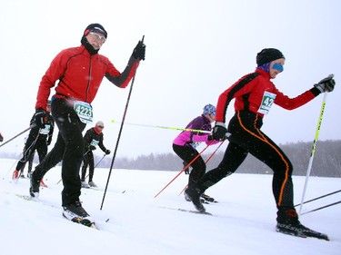 Skiers at the beginning of the Gatineau Loppet in Gatineau, Saturday, February 14, 2015. Competitors braved falling snow plus bone-chilling temperatures to participate in today's event, which started at 9am.