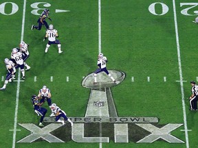 Tom Brady #12 of the New England Patriots throws against the Seattle Seahawks in the second half during Super Bowl XLIX at University of Phoenix Stadium on February 1, 2015 in Glendale, Arizona.