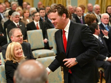2006: John Baird shakes hands with Laureen Harper before taking the oath and getting sworn in, February 6, 2006.
