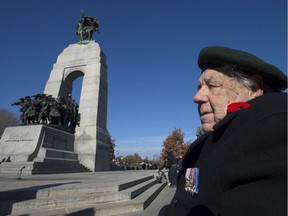 Second World War veteran Ted Patrick awaits the Remembrance Day ceremony at the National War Memorial last year. He acted as an interpreter at the Canadian War Museum.