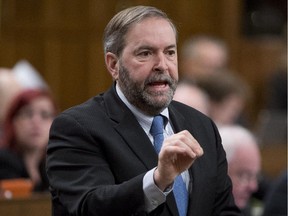 NDP leader Tom Mulcair rises during Question Period in the House of Commons Monday February 2, 2015 in Ottawa.