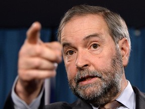 NDP Leader Thomas Mulcair speaks during a news conference on Parliament Hill in Ottawa on Wednesday, February 18, 2015.