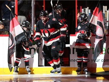 Chris Phillips #4 of the Ottawa Senators steps onto the ice during player introductions in his franchise record breaking 1179th game with the team.