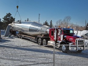 Workers have begun to remove the Atlas rocket at the Science and Tech museum, which was in serious disrepair.