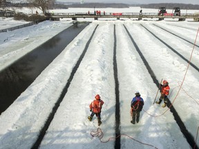 The City undertakes ice breaking operations near the Rideau Falls to alleviate possible spring flooding March 7.