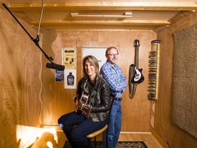 Lynne Hanson, left, and Kim Lymburner, shown in Lymburner's home studio in Ottawa, are among the directors working to establish Folkrum, a new music venue in the city. (Darren Brown/Ottawa Citizen)