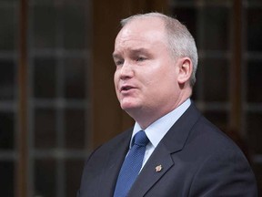 Minister of Veterans Affairs Erin O'Toole responds to a question during Question Period in the House of Commons Monday March 9, 2015 in Ottawa.