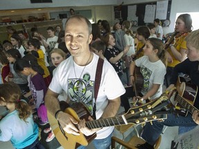 Teacher Ray Kalynuk says the school of rock program works 'because it acknowledges that the interests of the students should drive the kind of music we sing.'