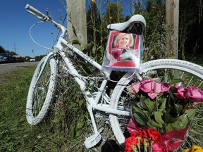 A ghost bike placed at the site on River Road where cyclist Laurie Strano was killed during the September 2014 Ride the Rideau event.