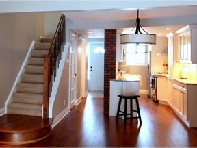 By removing the wall between the old kitchen and dining room, designer Paula-Lyn Cleveland was able to create an open galley kitchen.