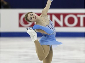 Alaine Chartrand of Canada performs during the Ladies Free Skating event in the ISU World Figure Skating Championship 2015 held at the Oriental Sports Center in Shanghai, China, Saturday, March 28, 2015.