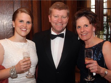 Alexandra Clark, corporate affairs director at Microsoft, with her parents, Global News chief political correspondent Tom Clark and Jane Clark at the Politics and the Pen dinner held at the Fairmont Chateau  Laurier on Wednesday, March 11, 2015.