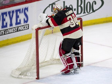 Ottawa Senators goalie Andrew Hammond stands in his crease after allowing the New York Rangers fifth goal during the second period.