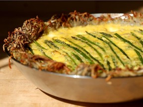 Shredded potatoes make a crunchy hash-brown crust for this creamy quiche.