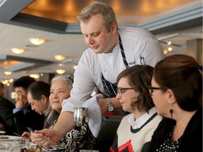 The NAC's Executive Chef, John Morris (pictured serving), used Arctic-sourced ingredients like char, caribou and seal to make mouth-watering dishes at an advance tasting of items to be served at the March 10 A Taste Of The Arctic fundraiser.