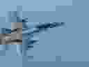 A CF-18 Hornet escorts a CC-150 Polaris after being refueled during Operation IMPACT on February 4, 2015.

Photo: Canadian Forces Combat Camera, DND

Un CF-18 Hornet escorte un CC-150 Polaris après avoir été ravitaillé pendant l’opération Impact, le 4 février 2015.

Photo : Caméra de combat des Forces canadiennes, MDN
IS01-2015-0002-029