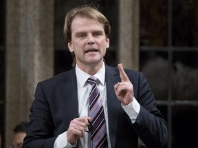 Minister of Citizenship and Immigration Chris Alexander responds to a question during Question Period in the House of Commons Monday March 9, 2015.