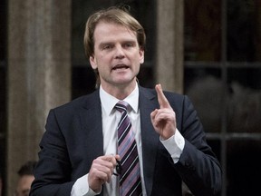 Minister of Citizenship and Immigration Chris Alexander responds to a question during Question Period in the House of Commons Monday March 9, 2015 in Ottawa.