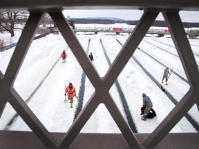 City workers finish up keeping the Rideau River keys clear of ice buildup as blasting will begin on the weekend at the top of the Rideau Falls.