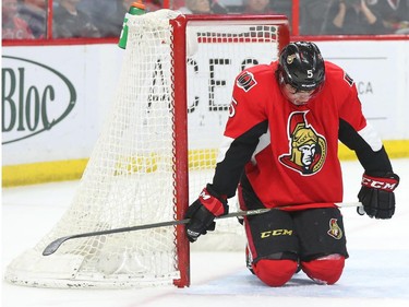 Cody Ceci of the Ottawa Senators shows his dejection after the second goal against his team by the Boston Bruins during second period NHL action.