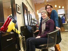 Connie Amey-Dawson, seated, is seen with Samantha Brooks of Hair by Design. Amey-Dawson says Brooks has shown her great compassion since she was diagnosed with breast cancer.