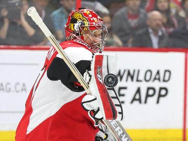 Craig Anderson of the Ottawa Senators makes the save against the Boston Bruins during second period NHL action.