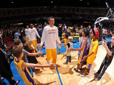 SAN DIEGO, CA- OCTOBER 6: Steve Nash #10 of the Los Angeles Lakers gets introduced before a game against the Denver Nuggets at the Valley View Sports Arena in San Diego, California on October 6, 2014 .