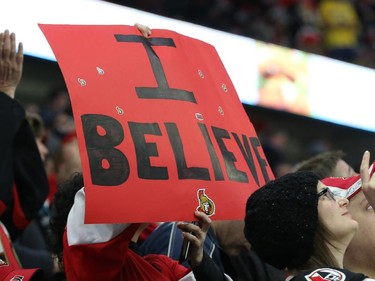 Fans believing after the Ottawa Senators victory against the Boston Bruins at Canadian Tire Centre in Ottawa, March 19, 2015.   (Jean Levac/ Ottawa Citizen)