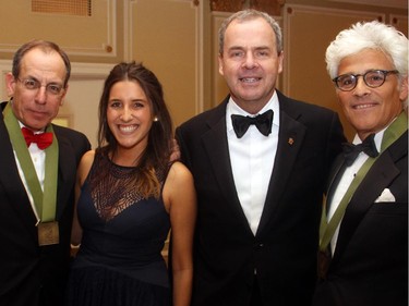 From left, author Andrew Cohen with Victoria Shore, Stephen Wallace, Secretary to the Governor General, and Gowlings partner Jacques Shore at the Politics and the Pen dinner held at the Fairmont Chateau Laurier on Wednesday, March 11, 2015.