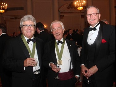 From left, Canadian authors Gordon Henderson and Richard Gwyn in conversation with former diplomat Colin Robertson at the Politics and the Pen dinner held at the Fairmont Chateau Laurier on Wednesday, March 11, 2015.