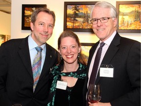From left, cellist Julian Armour with his wife, Thirteen Strings Chamber Orchestra executive director Guylaine Lemaire and board president Rob MacDonald at An Evening of Wine, Food and Art, held Tuesday, March 24, 2015, at Koyman Galleries on St. Laurent Boulevard.