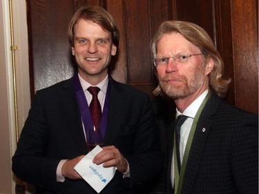 From left, Chris Alexander, Minister of Citizenship and Immigration, chatted with author Michael MacMillan at the Politics and the Pen gala dinner held at the Fairmont Chateau Laurier on Wednesday, March 11, 2015.