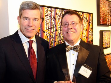 From left, Grant McDonald, KPMG, with Thirteen Strings Chamber Orchestra artistic director Kevin Mallon at An Evening of Wine, Food and Art, held at Koyman Galleries on Tuesday, March 24, 2015, in support of Thirteen Strings.