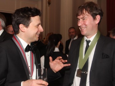 From left, Joseph Heath, who won the 2015 Shaughnessy Cohen Prize for Political Writing, in conversation with fellow author Taras Grescoe at the Politics and Pen dinner held Wednesday, March 11, 2015, at the Fairmont Chateau Laurier.
