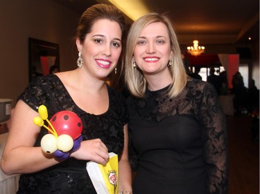From left, Lea Catana and her sister-in-law Crystal Catana attended the St. Patrick's Home of Ottawa's circus-themed 150th anniversary soiree, held at the Centurion Conference and Event Centre on Thursday, March 12, 2015.