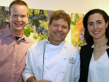 From left, Rob Roach, Beckta chef and partner Michael Moffatt and Christine Roach at An Evening of Wine, Food and Art in support of the Thirteen Strings Chamber Orchestra, held Tuesday, March 24, 2015, at Koyman Galleries.