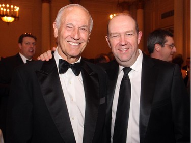 From left, Rogers Communications vice chairman Phil Lind with the company's president and CEO, Guy Laurence, at the Politics and the Pen dinner held at the Fairmont Chateau Laurier on Wednesday, March 11, 2015.