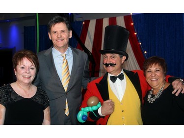 From left, Ruth Catana, executive director of the St. Patrick's Home of Ottawa Foundation, with its board chair, Jan Kaminski, ringmaster Aydin Suatac and event chair Sandy Ouellette at St. Pat's circus-themed soiree, held Thursday, March 12, 2015, at the Centurion Conference and Event Centre.