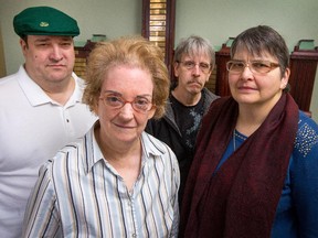 (from left) Scott Helman, Gladys Whincup, Robert Dore and Lise Langevin are four of the fifty worker/clients of the Ottawa-Carleton Association for Persons with Developmental Disabilities who are losing their jobs at a federal paper shredding facility at Tunney's Pasture after more than 30 years.