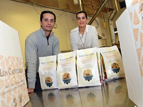 Gabriela Godinez-Laverty and José Godinez-Luna (L) from Los Cantores Mexican Corn Products.   (Jean Levac/ Ottawa Citizen) ORG XMIT: 0314 found